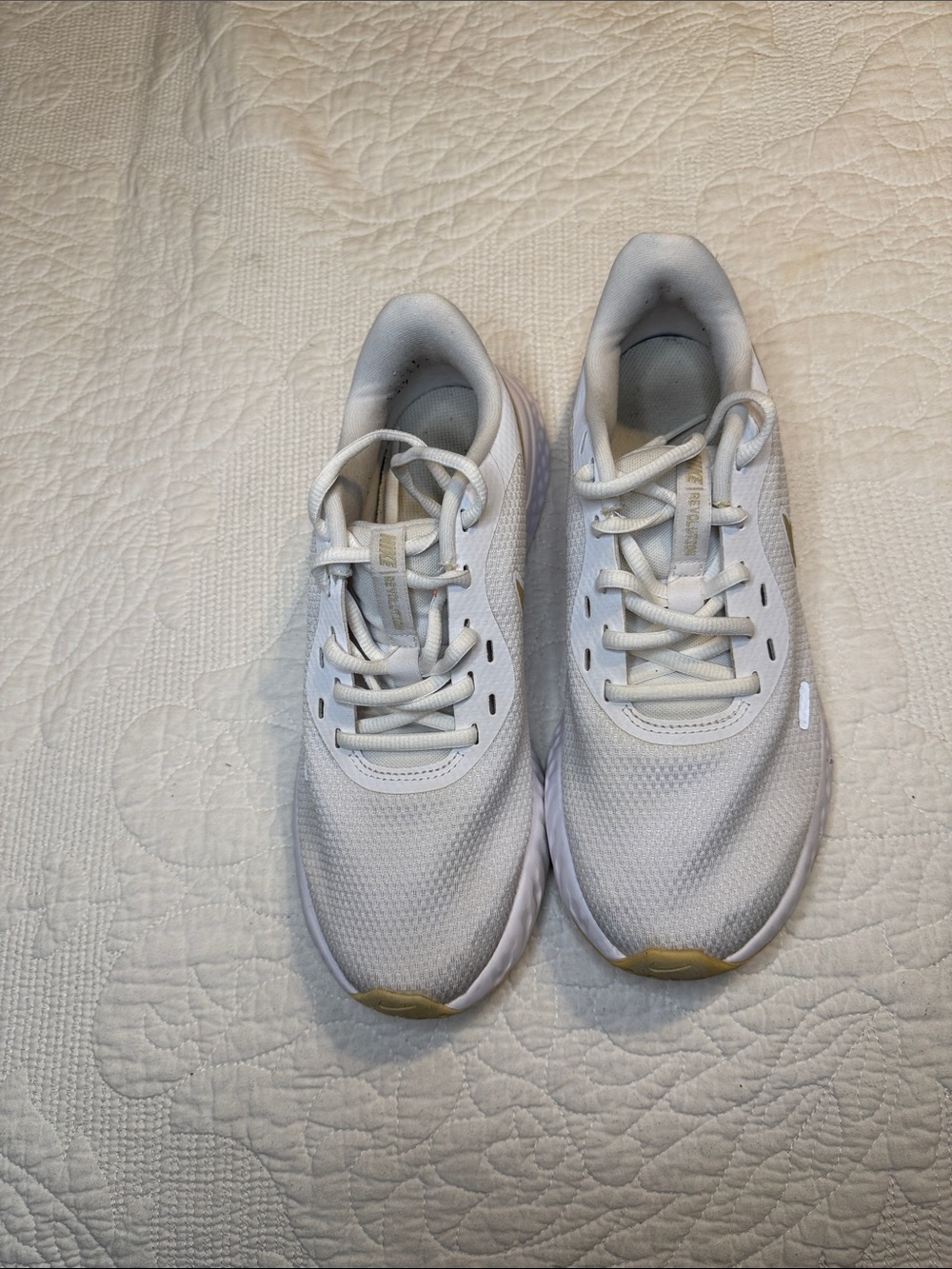 Nike Revolution white running shoe. Size 8.5.